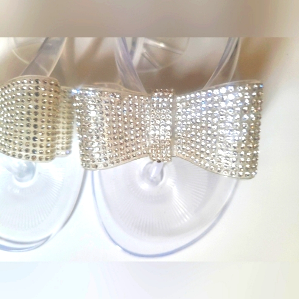 New never worn INC clear sandals with rhinestone bow